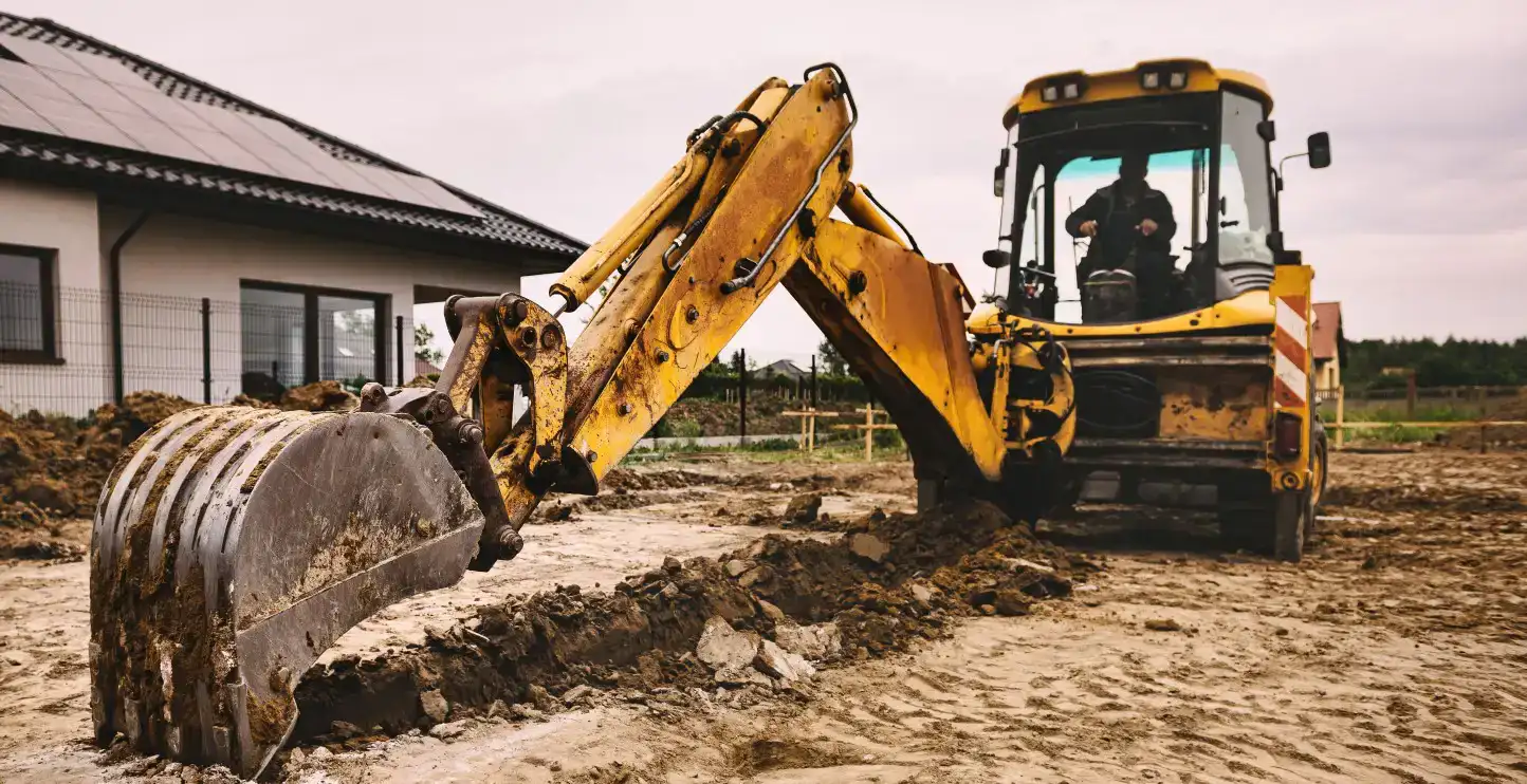 Worker Digging a trench